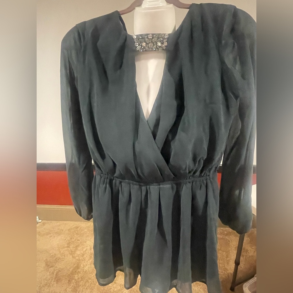 Deep forest green forever 21 romper. Medium. Never been worn. Open back